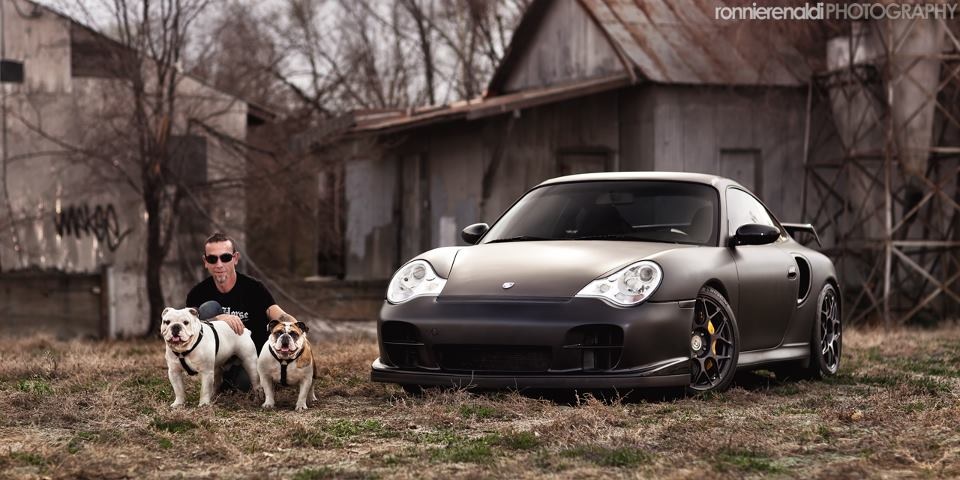 Two bulldogs and their owner